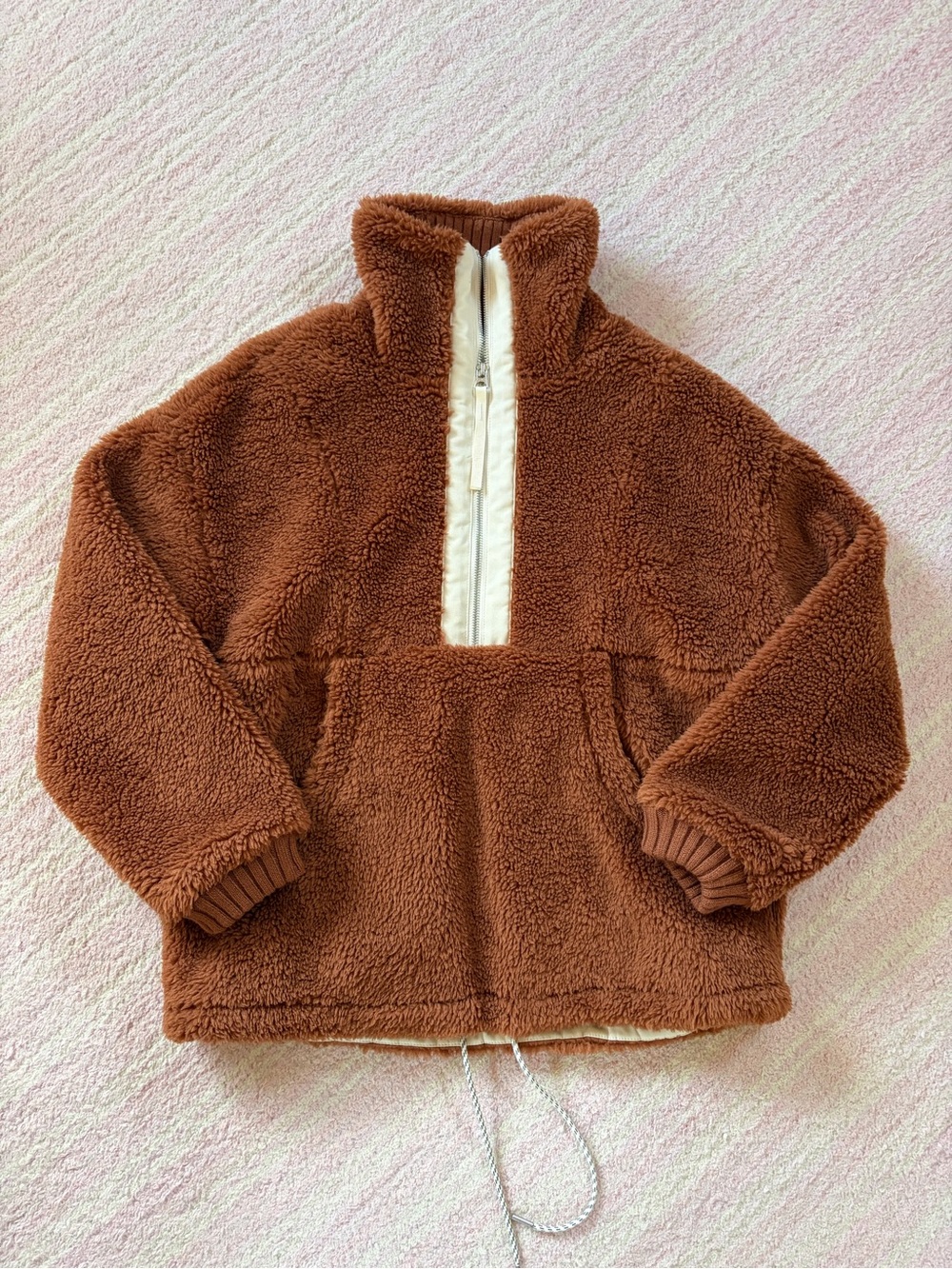Varley rust-brown fleece half zip with collar, and adjustable waist.